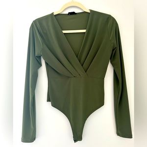 Long sleeved V neck green body suit size medium